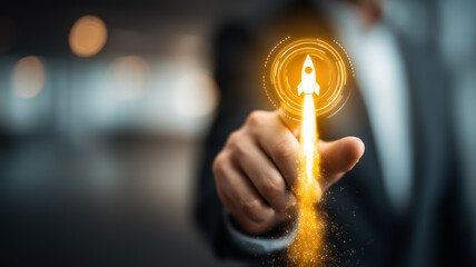 A business hand launching a digital rocket icon representing startup activation and rapid business growth, illustrating innovation momentum and strategic execution.
