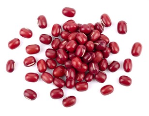 Overhead shot of a pile of small, dark red, kidney-shaped beans scattered