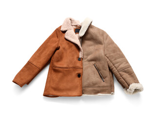 Different warm jackets on white background