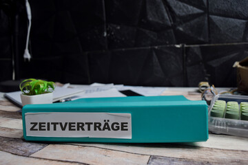 Folders with the label zeitvertrage in Germanit means temporary contracts. Business management...