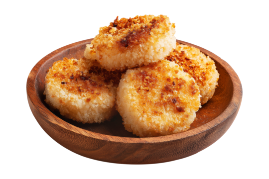 Crispy golden fried sago cakes on wooden plate isolated on white transparent background, concept of Papua New Guinea breakfast food.