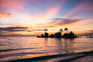 Willy's rock and ocean at sunset, Boracay, Philippines
