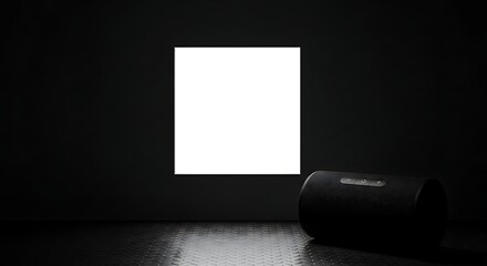 Projector in Dark Room: An cylindrical object, illuminated by a single square source of light, creates an intimate, modern atmosphere, in the middle of darkness.