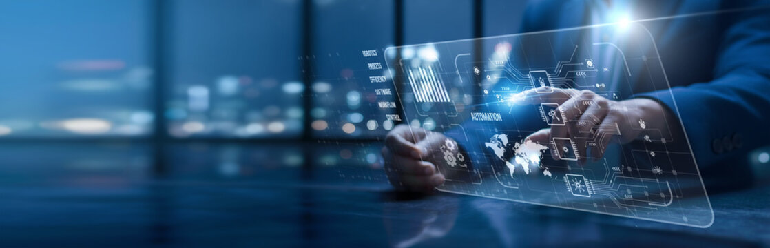 Automation. Engineers using a modern interface to control automation systems. Smart robotics increase efficiency, reduce errors, and drive innovation across industrial operations. - Powered by Adobe