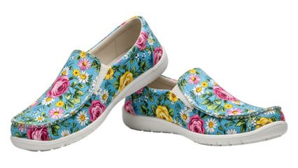 Pair of casual slip-on shoes displays vibrant floral pattern against a solid dark background