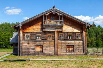 Old Russian Log House with Small Windows