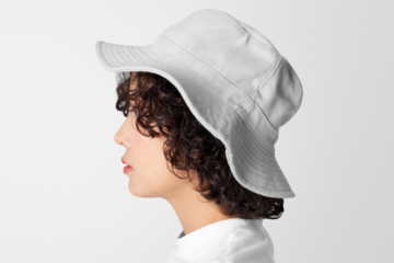 Png bucket hat and t-shirt mockup on woman with short curly hair