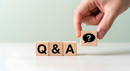 Engaging Q&A session illustrated by wooden blocks with a question mark, perfect for presentations and marketing, offering clarity and insightful answers