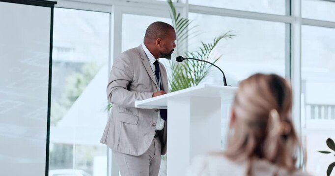 Presentation, nervous and man in office at podium, preparation and anxiety for training workshop. Stress, sweat and business person in agency with tech, crowd pressure and worry for seminar speech.