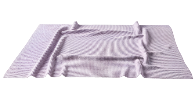 Soft, textured textile material drapes with gentle folds against a dark background