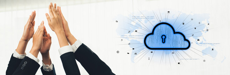 A concept image showcasing teamwork and cloud security with multiple hands raised in collaboration...