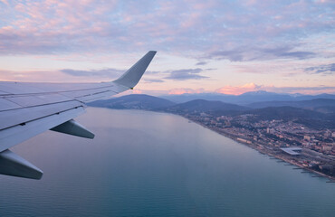 Fototapeta premium The view from a plane taking off over a Black sea coast. Krasnodar Krai. Russia