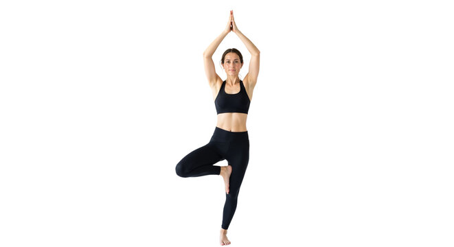 Balanced woman performing yoga tree pose against a white backdrop - Powered by Adobe