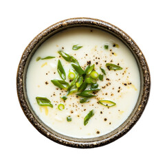 Creamy Potato Soup with Green Onions and Black Pepper in Rustic Bowl on transparent background