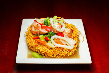 Seafood Stir-Fry on Crispy Noodle Basket