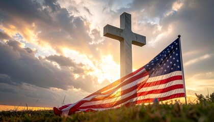 Stone cross monument and American flag silhouetted at sunrise on grassy hill for editorial tribute photography patriotic faith design and poetic remembrance-themed visuals
