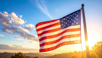 American flag waving in wind against vibrant sunrise or sunset sky with scattered clouds for editorial patriotic photography national pride design and poetic freedom-themed visuals