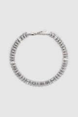 Elegant silver necklace adorned with sparkling crystals on a clean background