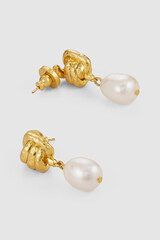 Elegant golden knotted earrings with delicate white pearl drops fashion jewellery