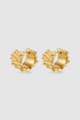 Two golden hoop earrings with intricate texture detail and modern design