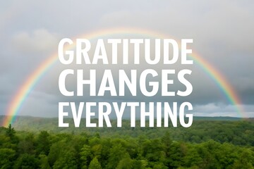 Rainbow appearing after a storm above a green forest