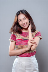 Confident Smiling Asian Woman with Natural Elegance