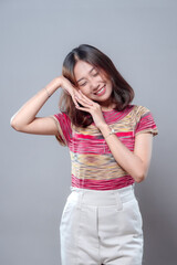 Cheerful Asian Woman Smiling with Relaxed Pose
