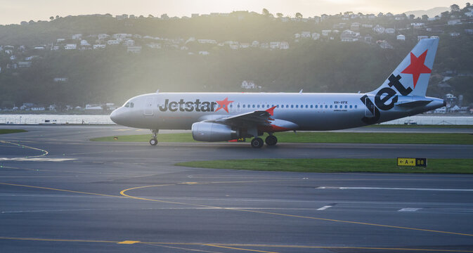 Wellington, New Zealand &ndash; October 24 2025: Jetstar VH-VFK Airbus A320-232 taxiing on the runway at Wellington International Airport.