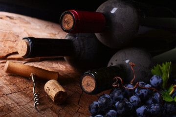 Red wine bottle and grapes