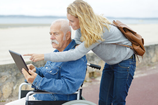 portrait of happy old father and his daughter outdoors - Powered by Adobe