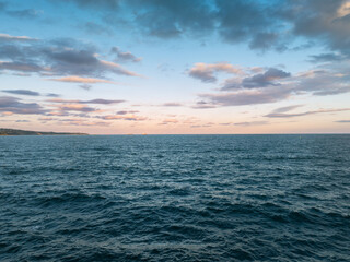 Aerial view over the sea waves, with Reflective Ripple surface