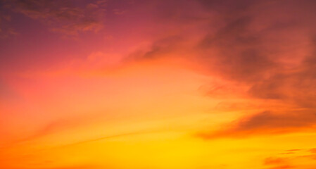 Fototapeta premium Sky sunset evening sunrise cloud weather dramatic landscape goldent and indigo color gradient pastel horizon, twilight yellow golden reflection morning nature environment energy ecosystem.