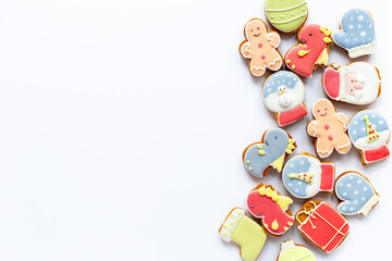 Set of different Christmas and New Year gingerbread cookies on white background, top view