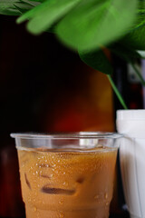 Iced coffee in glass cup on table