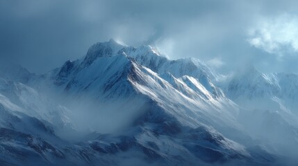Fototapeta premium Snow covered mountain peaks emerge through soft swirling clouds in a tranquil winter setting.