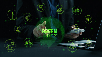 A modern digital concept showcasing green energy and sustainability through technology. Features a business professional engaging with renewable energy icons on devices. Cipher