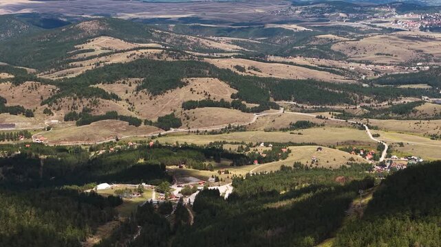 Aerial View of Zlatibor Mountain in Summer Season, Serbia. Green Valley and Pine Forest