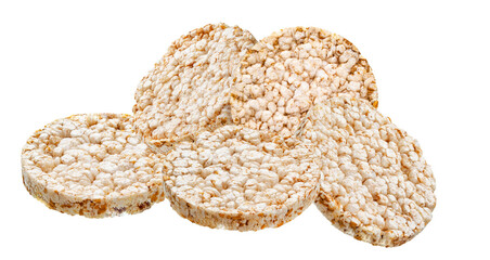 realistic photograph showcasing a carefully arranged stack of round, toasted puffed rice cakes isolated against a sharp black backdrop.