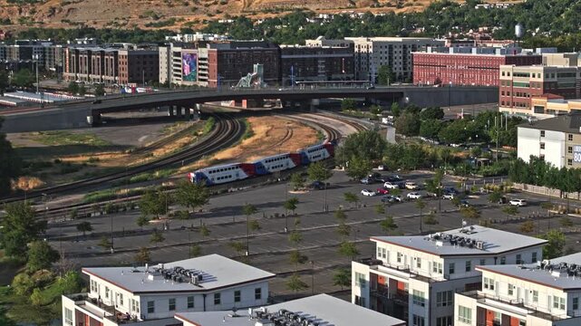 Aerial Shot Following UTA FrontRunner Public transportation in Downtown Salt Lake City