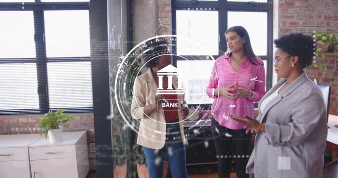 Discussing digital bank icon overlay, three women wearing blazers working in office with phone