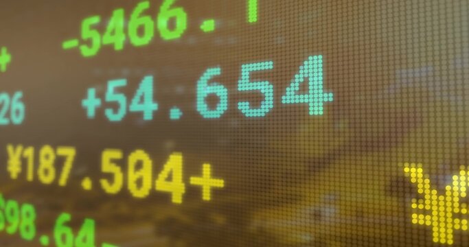 Displaying LED ticker showing market figures at harbor, with yen symbol, plus minus signs