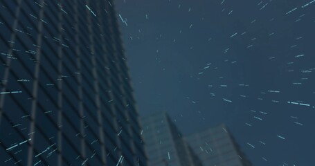 Showing glass skyscraper rising upward downtown night, with grid windows, cyan streaks, copy space