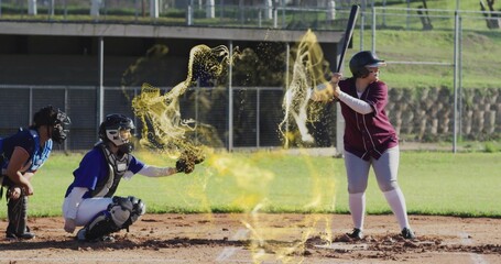 Swinging batter wearing maroon jersey holding bat at home plate, with golden mist swirl, copy space