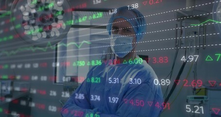 Standing surgeon wearing blue surgical gown in surgical suite, displaying financial data overlay
