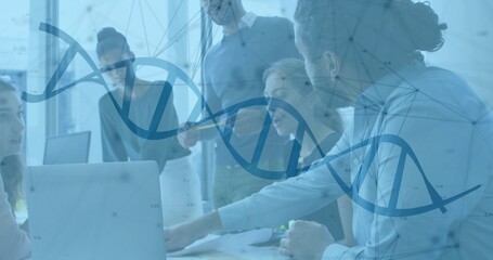 Reviewing five scientists examining documents, DNA helix in conference room, with laptop tablet