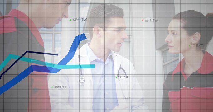 Healthcare team discussing metrics in hospital corridor, with white coat, red jackets, line graphs - Powered by Adobe