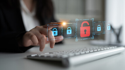 Digital security concept illustrating a cybersecurity breach, with a red unlocked padlock...