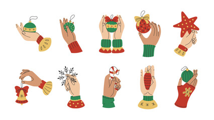 Human Hands Holding Christmas Ornaments Set. Flat vector illustrations of Gestures with Holiday Decorations. Wrist in Knitted Sweater showing festive Baubles, Snowflake, Bell, Candy Cane, Star Topper.