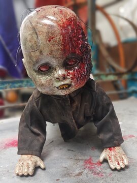 Scary horror doll Creepy doll Halloween concept, Close up of Ghost blood doll mystic in abandoned places background