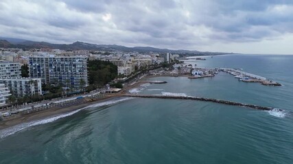 Aerial Landscape views of Marbella coastal city. Marbella is a city and resort area on southern Spain’s Costa del Sol, part of the Andalusia region. Ambient drone exploration.